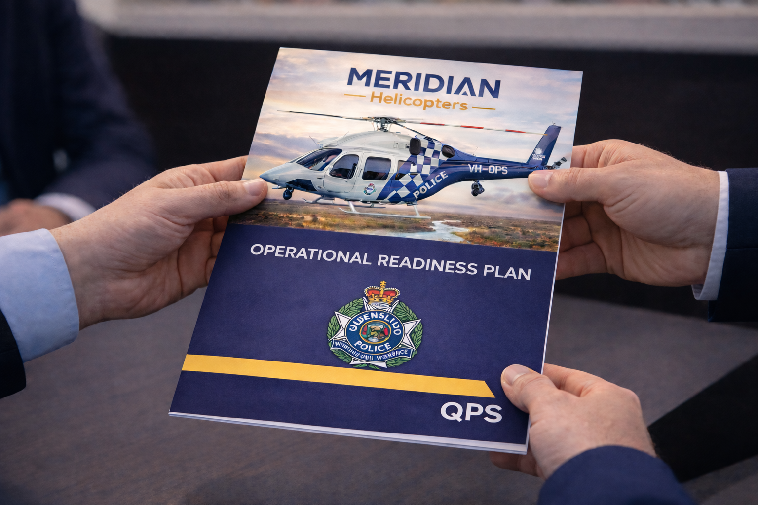 Person holding a 'Meridian Helicopters Operational Readiness Plan QPS' document with a helicopter image on a blue background.